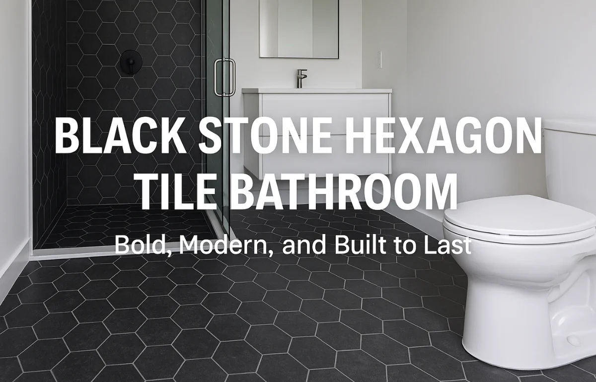 Modern black stone hexagon tile bathroom with stylish floor and shower tiles, white vanity, and glass enclosure.