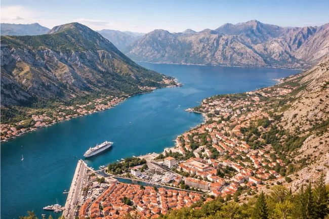 Kotora Melnkalne showing Kotor nestled inside the Bay of Kotor with surrounding mountains and Adriatic coastline