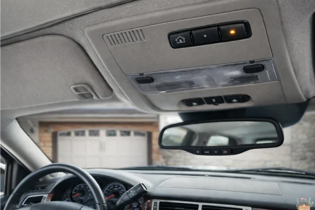 08 Yukon Program Garage Door Opener shown on the overhead HomeLink console inside a 2008 GMC Yukon